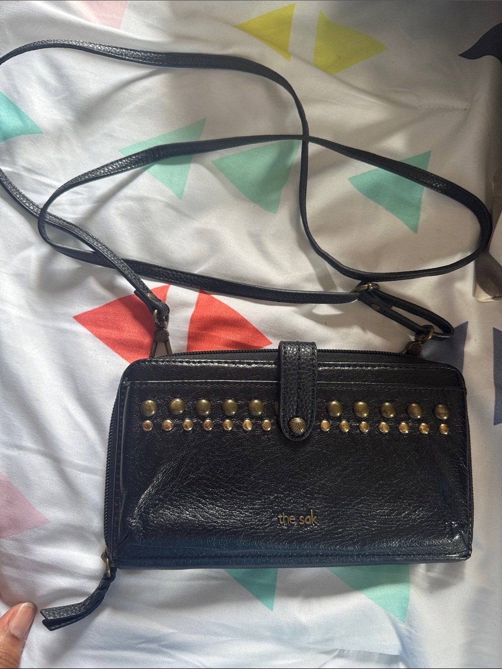 The Sak Black Leather Crossbody Wallet with Gold Stud Detail